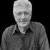 JOHN L. COMAROFF